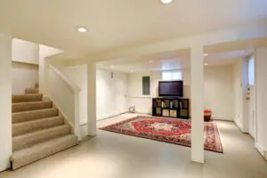 Basement Living Space with Concrete Floors - South Shore Basement Finishing